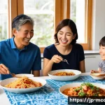 다문화 요리사와 플랜트 기반 요리 - **A Vibrant Multicultural Family Feast at Home:**
    "A heartwarming scene of a Japanese family, in...